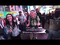 Weaving past people in Times Square while creating an original song