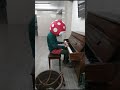 Piranha plays Dire Dire Docks on piano and stares to camera after forgetting how the song goes