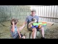 Using nerf guns on the farm | Stopping the bad guy from taking our hay | Nerf gun for kids