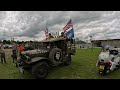 Military vehicles leaving British Memorial in Normandy, as part of D-Day 80th Anniversary.