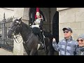 POLICE and HORSES in RIOT GEAR as the King's Guard is removed when a protest passes Horse Guards!