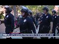 Police march towards pro-Palestine protesters on USC campus