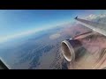 Airbus A319-100 takeoff over the desert terrain & the strip