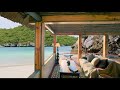 ENERGY HEALING AMBIENCE: Amazing veranda overlooking a sunny tropical beach!