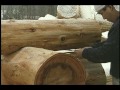 Building log cabin: Saddle notch a log
