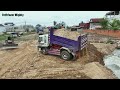 Pour soil to clear the lake, Processing By Bulldozer MITSUBISHI BD2F, Dump Truck Unloading