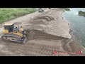 Skillfully Shantui Dozer pushing sand into water, Dongfeng Truck loading sand filling for foundation