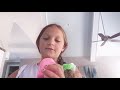 Caroline playing with pink fluffy slime