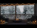 Winter cozy veranda in the forest with a bonfire, falling snow and the sounds of a blizzard