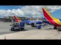 Southwest airlines landing in Honolulu international Airport with scenic view in 4K.