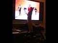 Cute cat kitty watches TV and loves the Rolling Stones