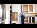 How to INSTALL KITCHEN CABINETS (and remove them)! // DIY Kitchen Remodel Pt. 1