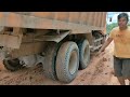 The truck driver put on a panicked face seeing that the road was getting worse