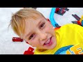 Chris plays with Hot Wheels cars and builds Hot Wheels City