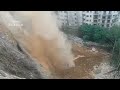 The excavator is falling down from the Mountain