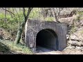 A walk to Stretcher Neck rail tunnel. Train speeds through tunnel. Prince West Virginia.
