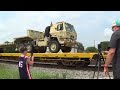 BNSF Militiary train passes tower 26