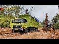 Two motor graders release their internal power when in the mud