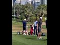 Watch Rory McIlroy ignore Patrick Reed when he tries to say hi and after he throws a tee in Dubai