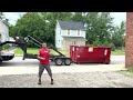 Avoid Damage! How to Safely Pick Up a Dumpster with Tips
