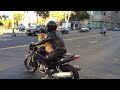 Dog dons helmet and goggles for cute motorcycle ride in Oakland.