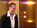 Mika Häkkinen is surprising Michael Schumacher on a TV show