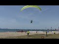 paragliding landing in the beach