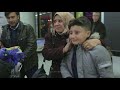 Syrian refugee child reunited with his parents.