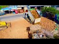 Starting new project!! Amazing Komatsu bulldozer D31P pushing stone,soil & 5Ton dump truck delivery