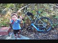 Logan riding his Strider Bike