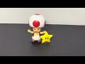 Super Mario, toad action figure with star.￼