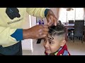 African Mum cuts biracial son's hair