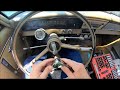 Removing a steering wheel on a 60's GM vehicle.