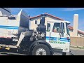 City of Torrance Trucks on Route Revving Grey and Black Cans