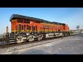 Eastbound BNSF Grain Train Empties leaving town shortly after crossing the Border.