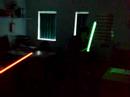 Colleagues fighting with Lightsabers