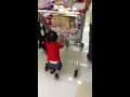 Tristan with the shopping cart at Seafood City.