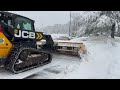 SKID STEER WITH A 13 FOOT SNOW PUSHER!