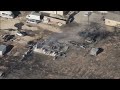 Lancaster brush fire destroys home
