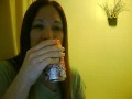 Woman burps after drinking a can of coke.