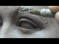 Sculpting open eye in a water based clay. Visual tutorial