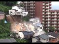 house falls onto another house