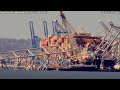 In Baltimore the barge Weeks 533 removing containers from the Dali Francis Scott Key Bridge Collapse