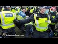 UK Police State - British Police officers give anti lockdown protester a kicking