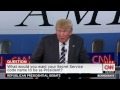 Trump gives Bush a low-five after debate joke
