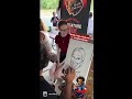 Super shy young lady gets caricature drawn by Alani J