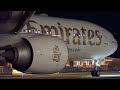 Capturing the Night Magic of an Emirates Boeing 777-300ER at Zurich Airport