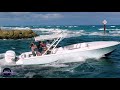 LADY GOES DOWN AT BOCA INLET !! | HAULOVER INLET BOATS | WAVY BOATS