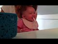 Baby girl laughing hysterically