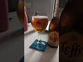 Pouring a bottle of Leffe Blonde into a Leffe Glass